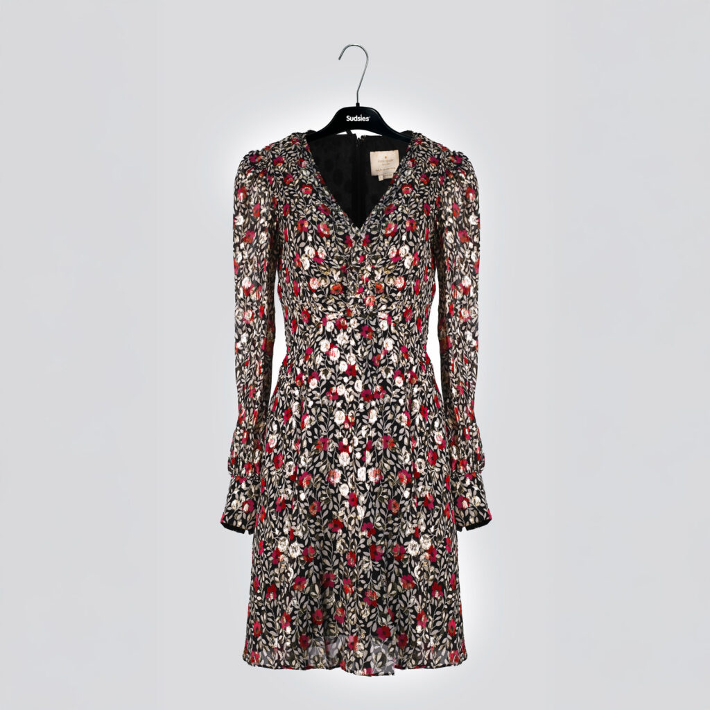 Designer floral dress on Sudsies hanger after professional dry cleaning